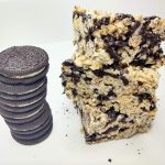 3 Oreo Rice Krispie Treats stacked next to a stack of 3 Double Stuffed Oreos