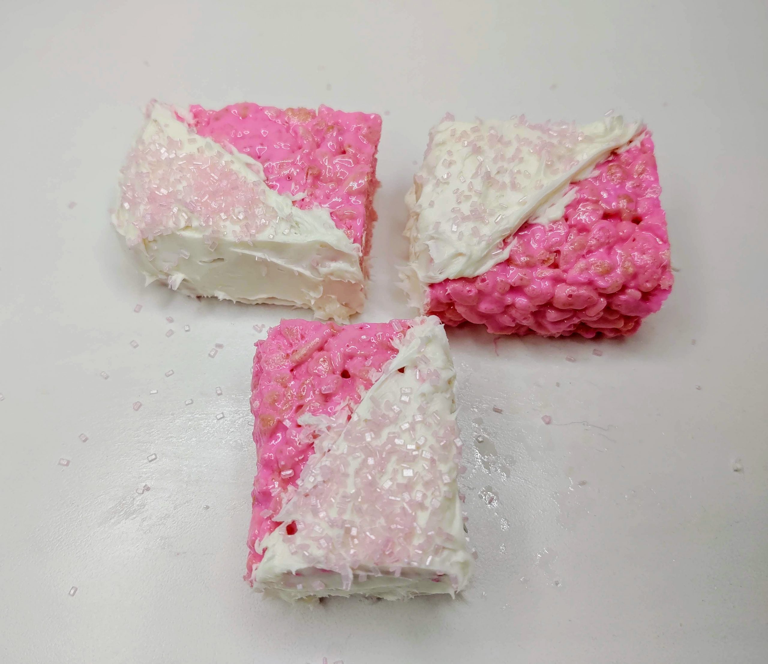 three pink baby shower Rice krispie treats