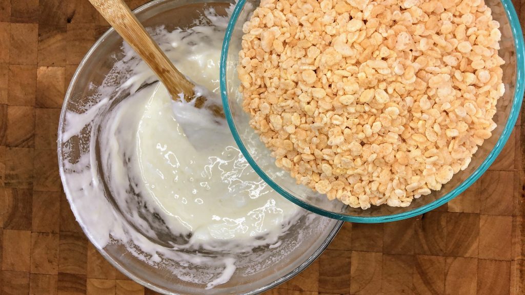 rice krispies about to be poured into melted marshmallows