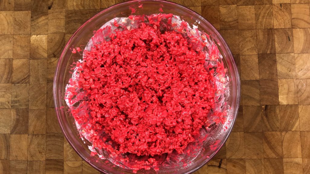 red rice krispie treats in a bowl