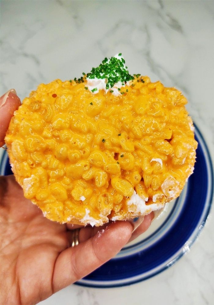 pumpkin rice krispie treat being held