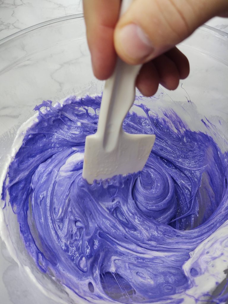 purple food coloring in melted marshmallow