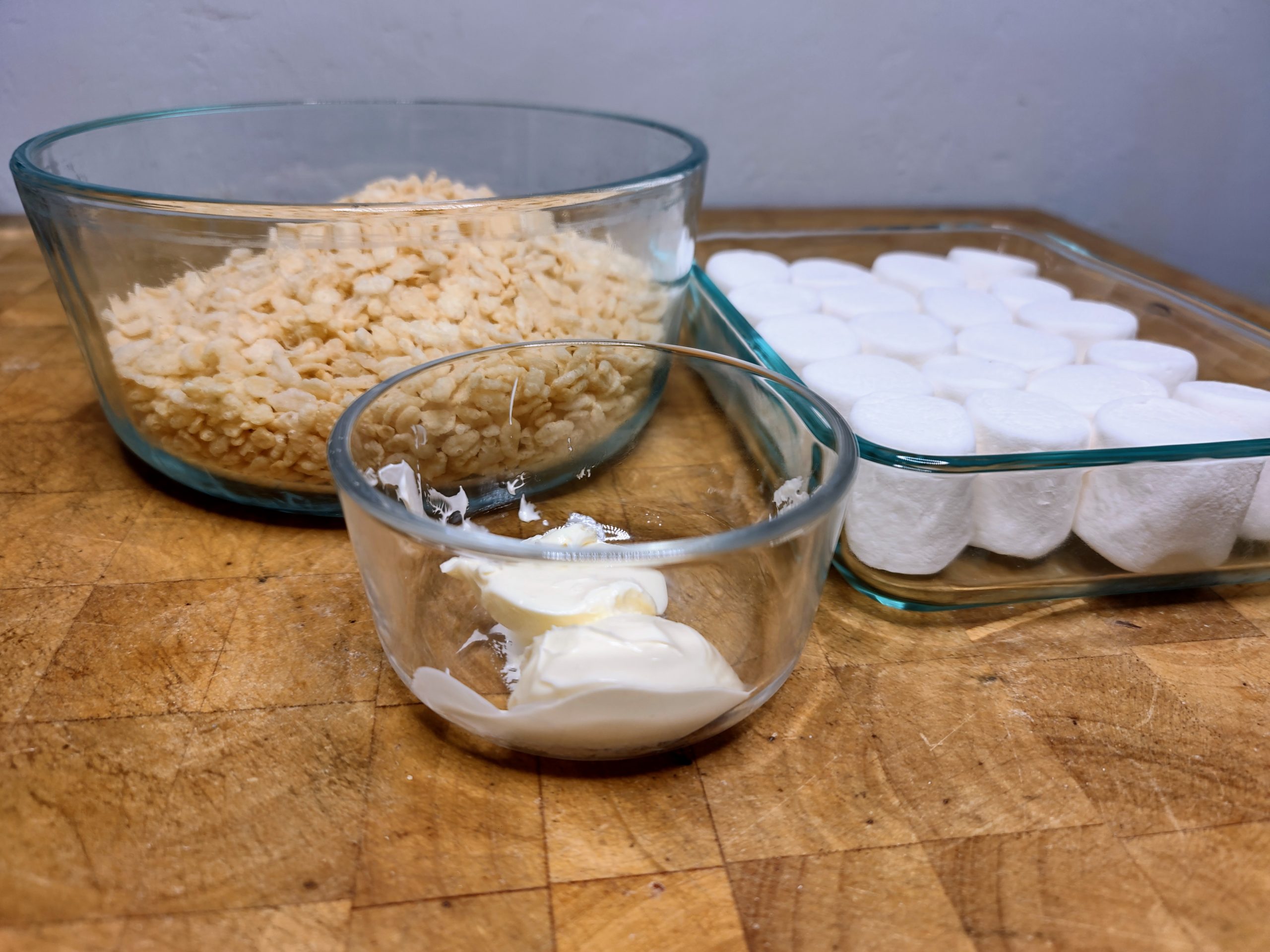 bowls of rice krispie cereal, marshmallows and vegan butter