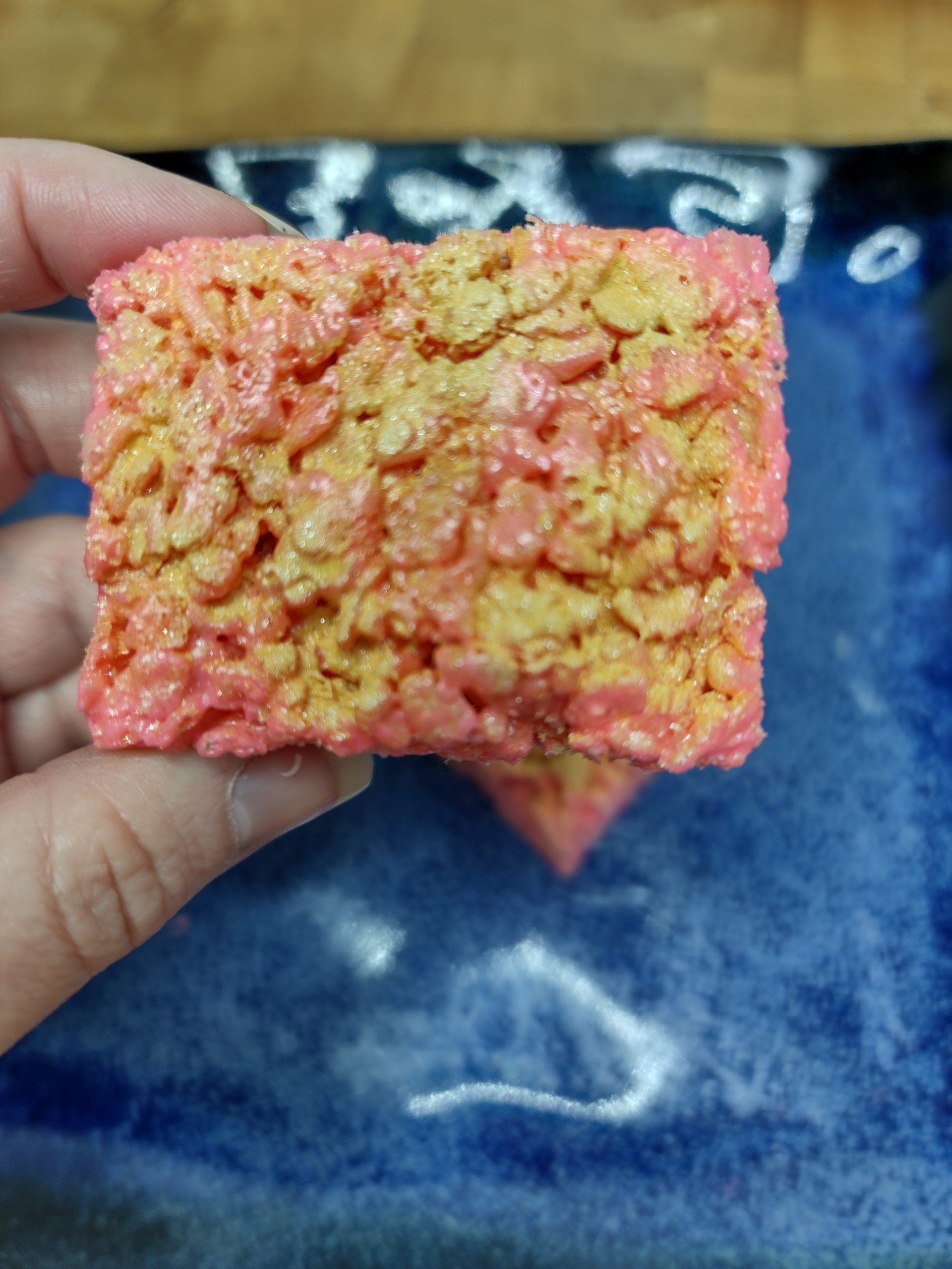 closeup of pink and gold rice krispie treat