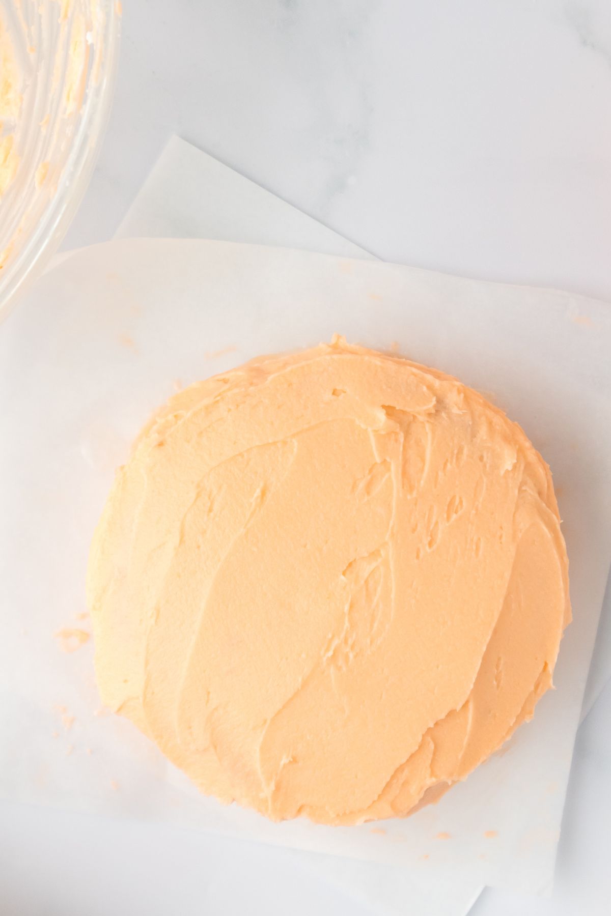 Lunchbox cake with orange icing.