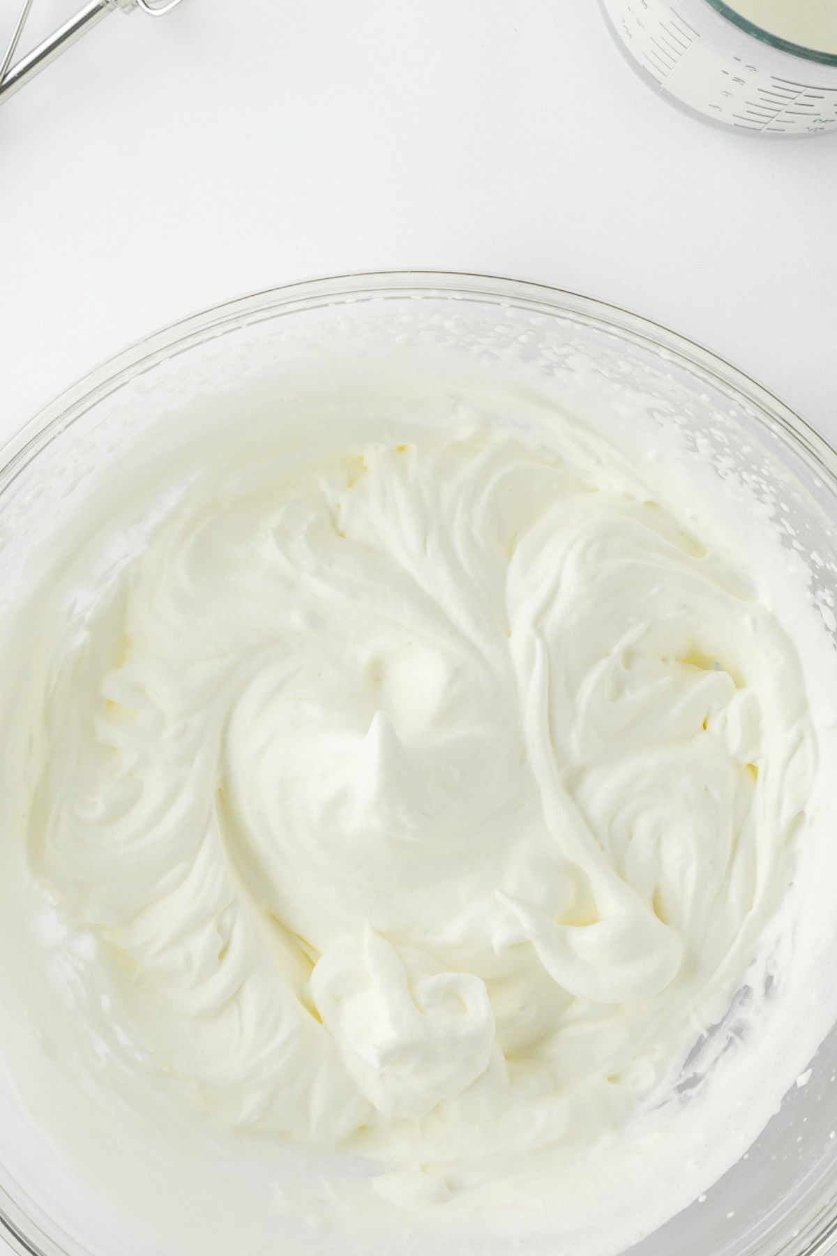 Heavy cream that has been whipped into whipped cream.