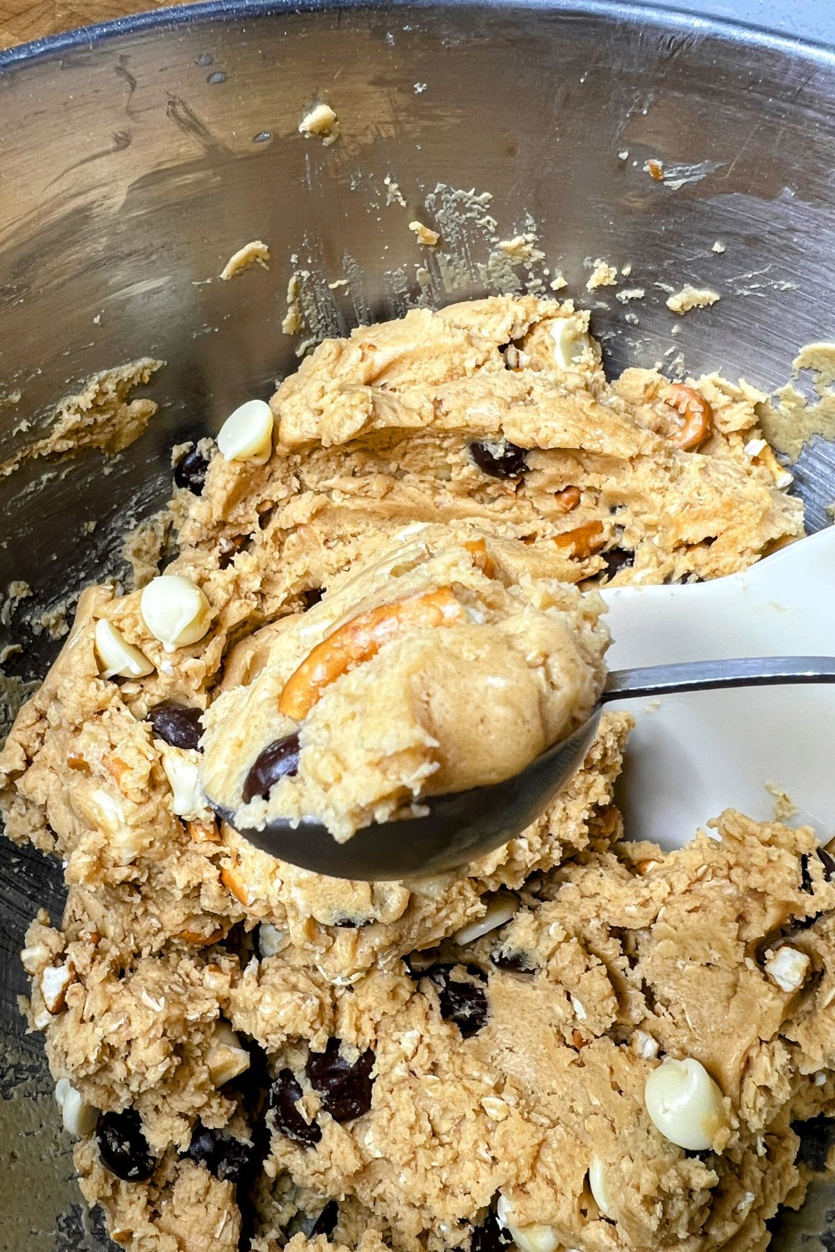 Scooping everything cookie dough with a spoon.