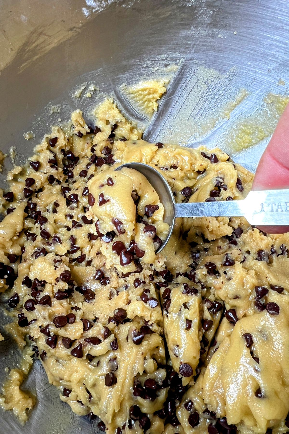 Spoonful of no butter chocolate chip cookie dough.