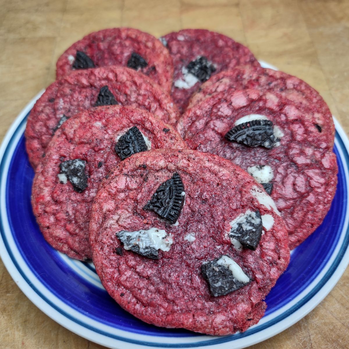 Oreo red velvet cookies on a plate.