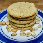 Stack of peanut butter cookies without brown sugar on a plate.
