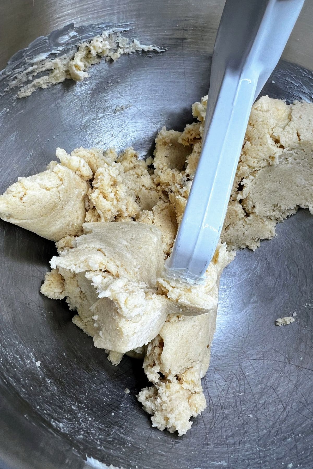 Creaming butter and sugar together in a mixing bowl.