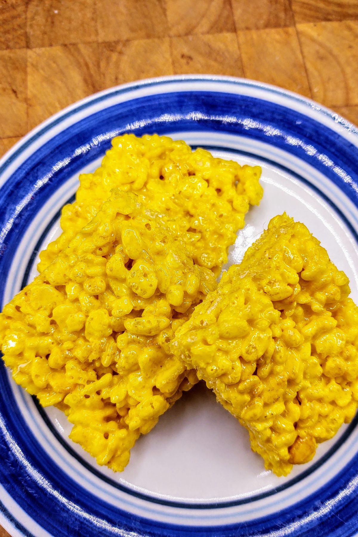 Stack of yellow rice krispie treats.