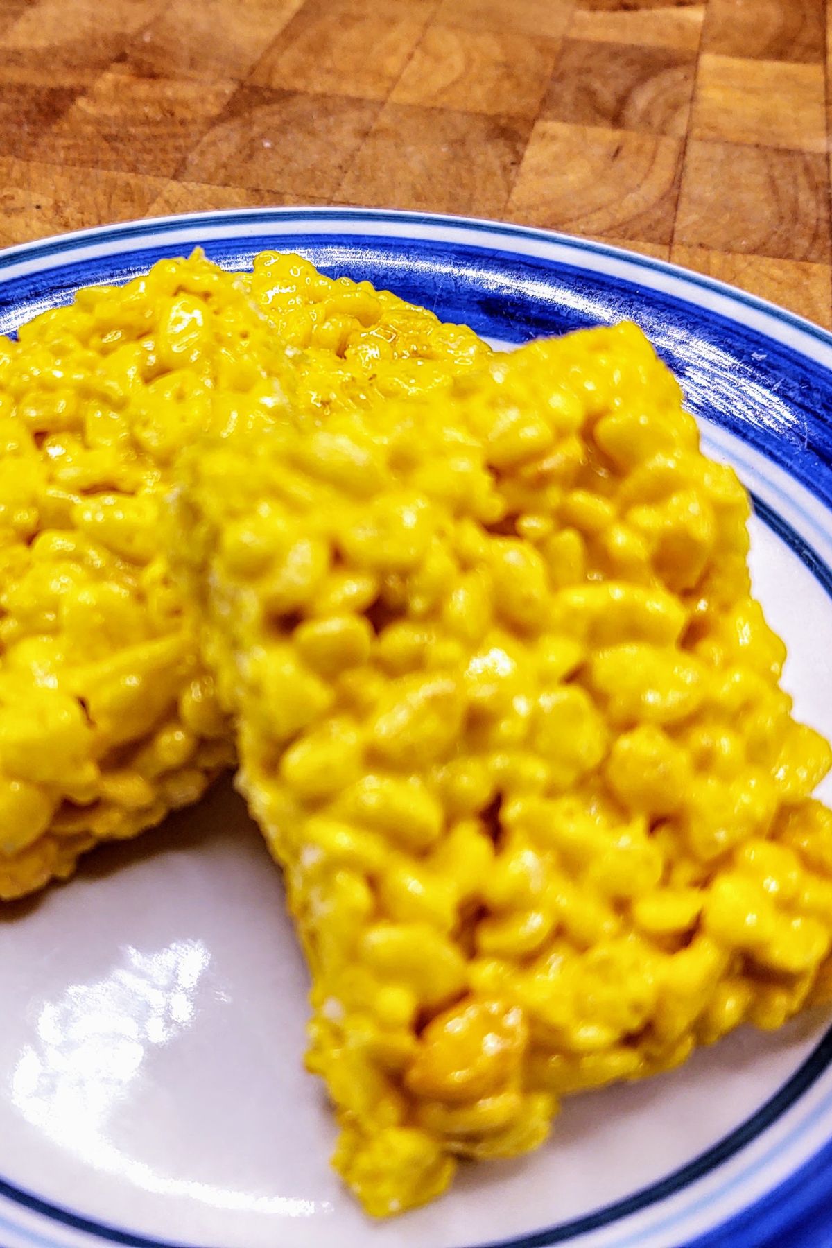 Plate with yellow rice krispie treats.
