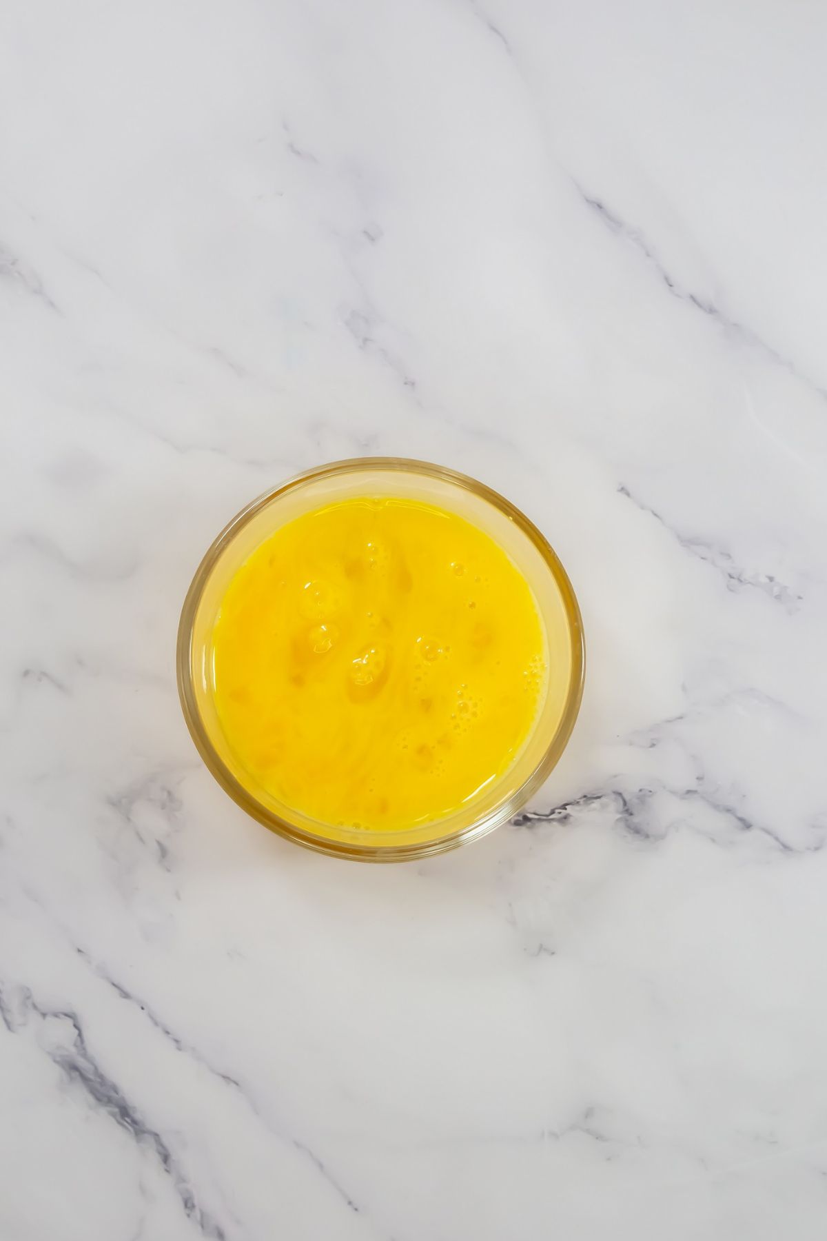 Melted butter in a bowl.