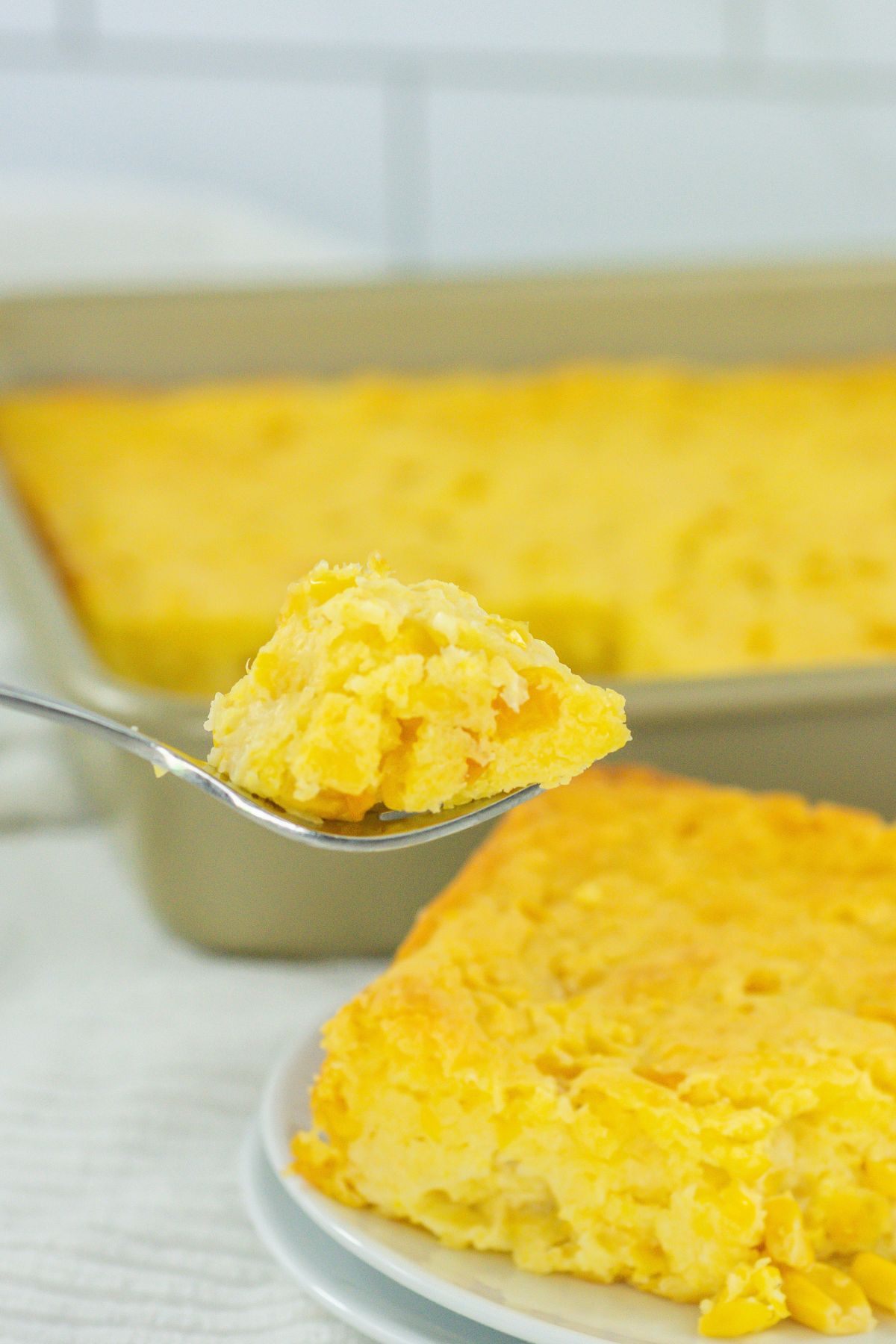 Corn casserole on a fork.