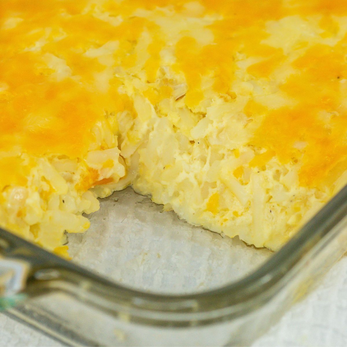 Hashbrown casserole cooked in pan.