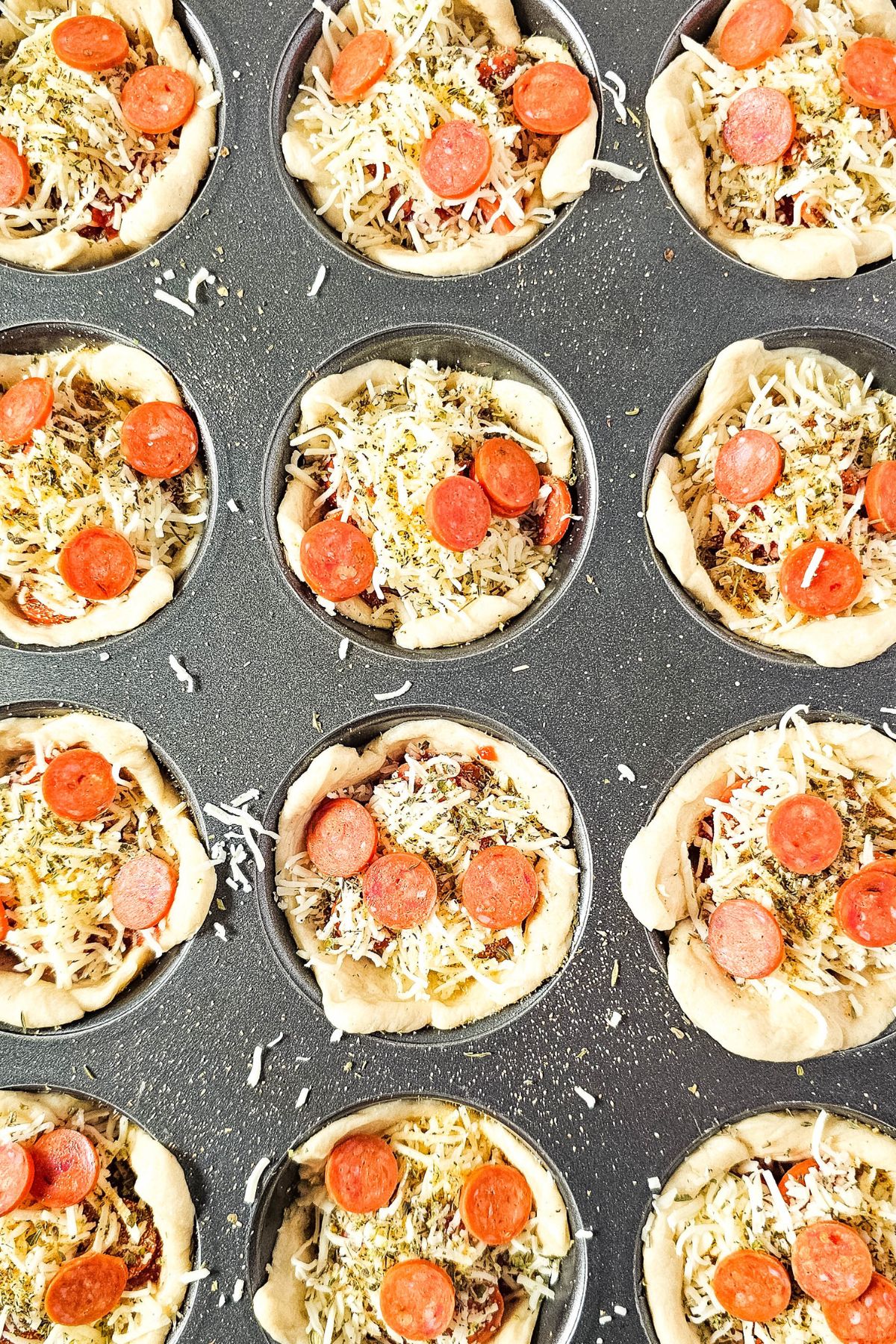 pepperoni added into puffs.