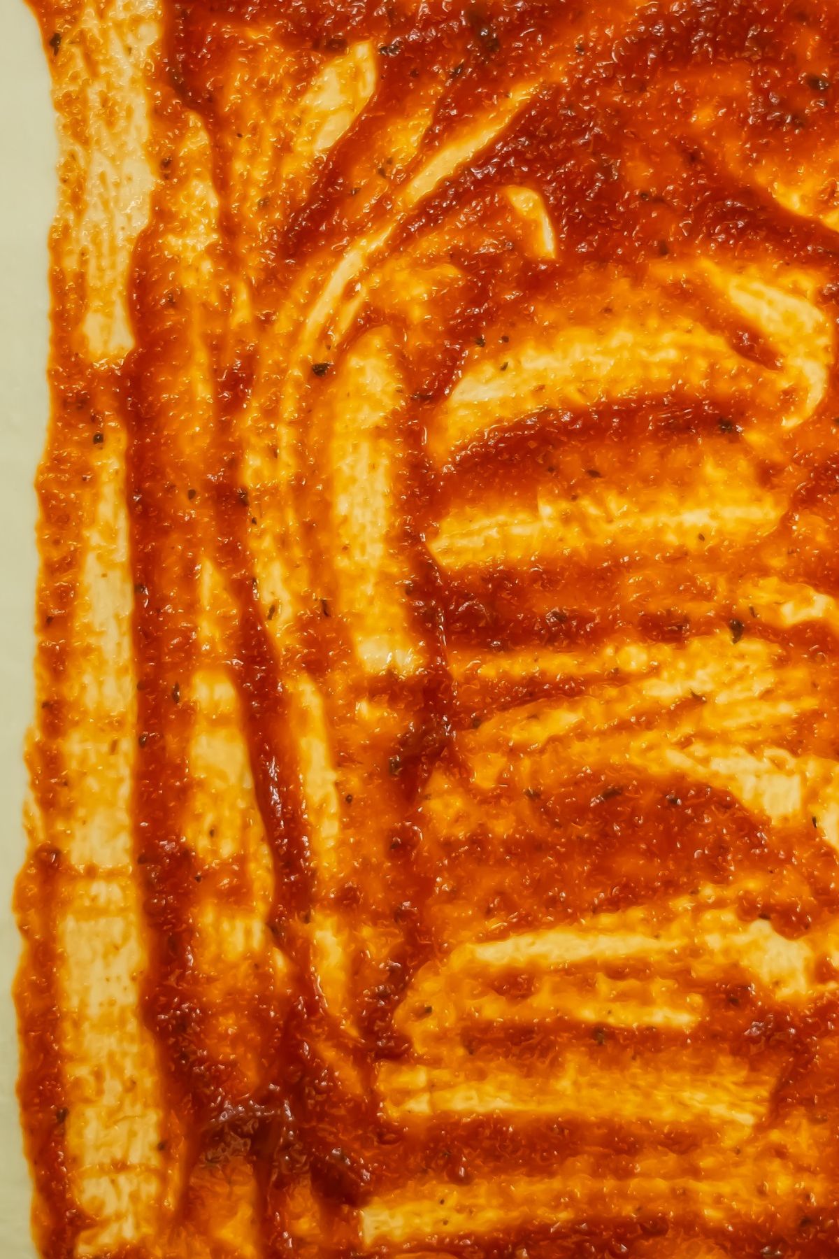 Tomato sauce on top of puff pastry.