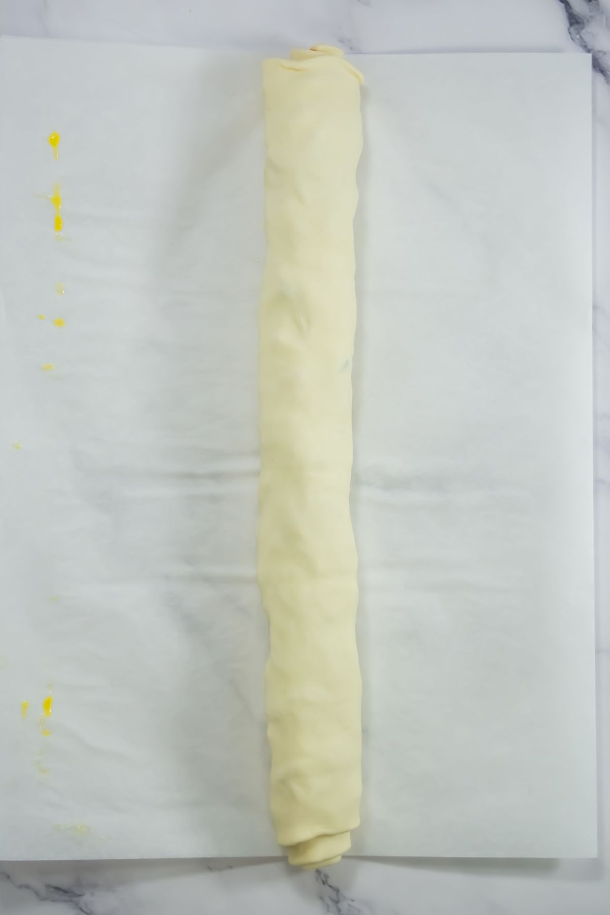 Puff pastry rolled into a log.