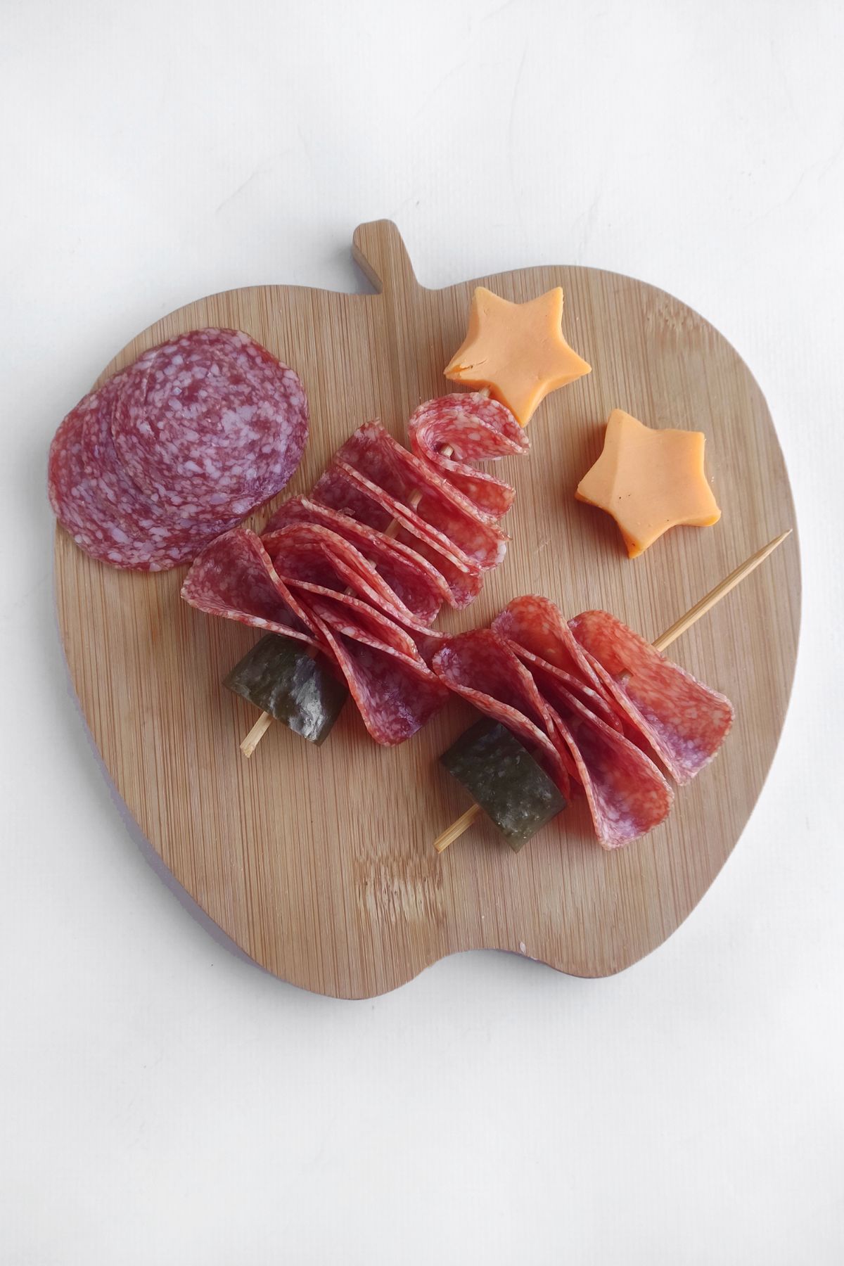 Putting cheese stars on top.