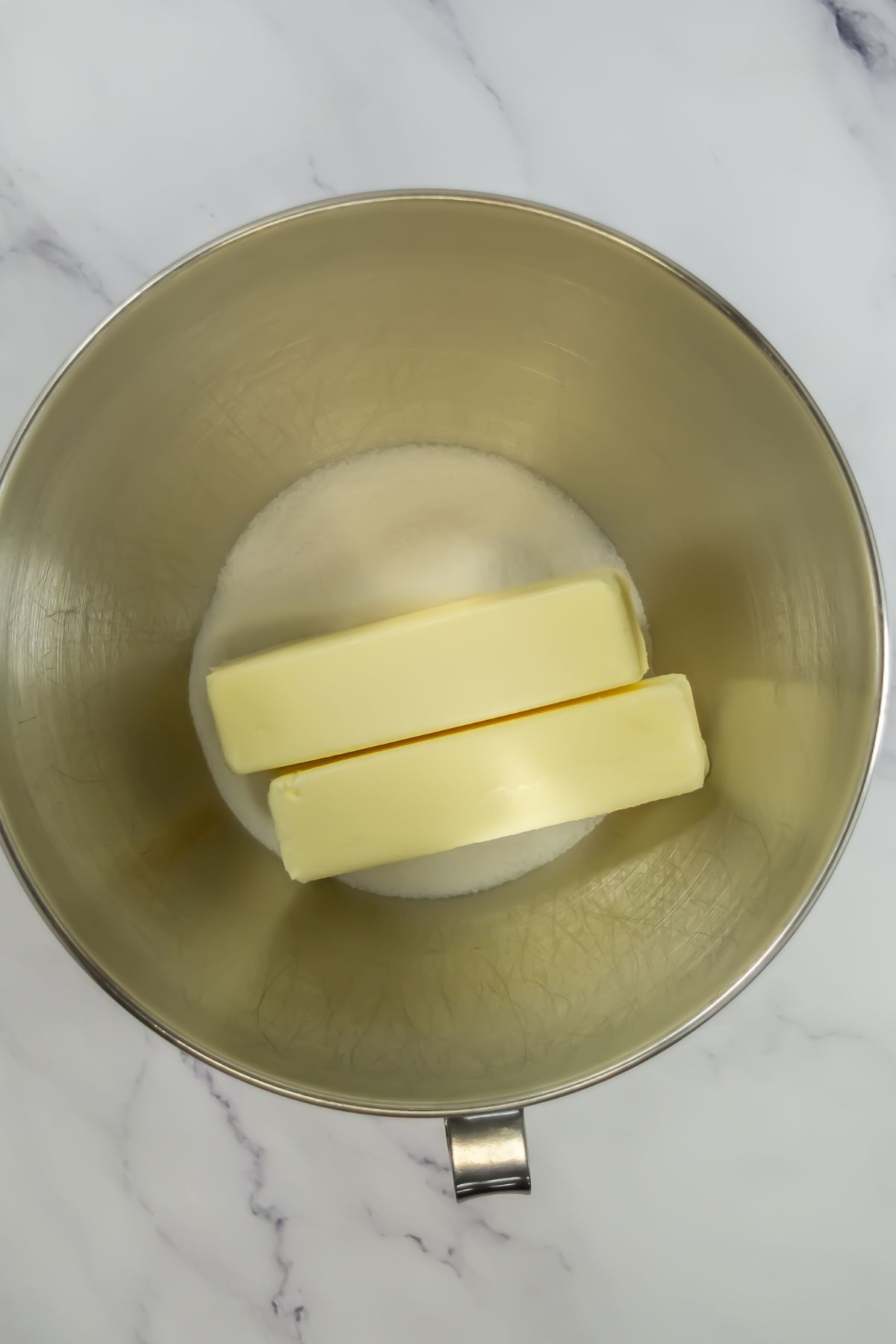 Butter and sugar in bowl.