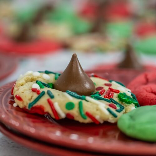 Holiday blossom cookies on a plate.