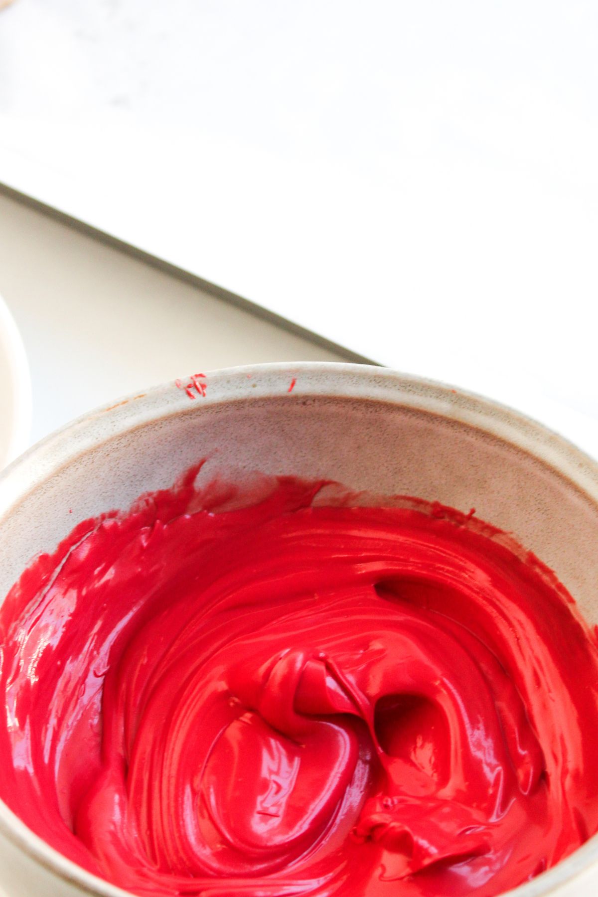 Melted red candy melts.