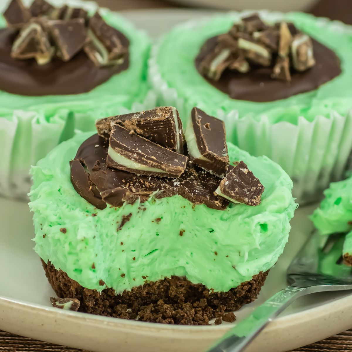 Andes mint cheesecakes on a plate.