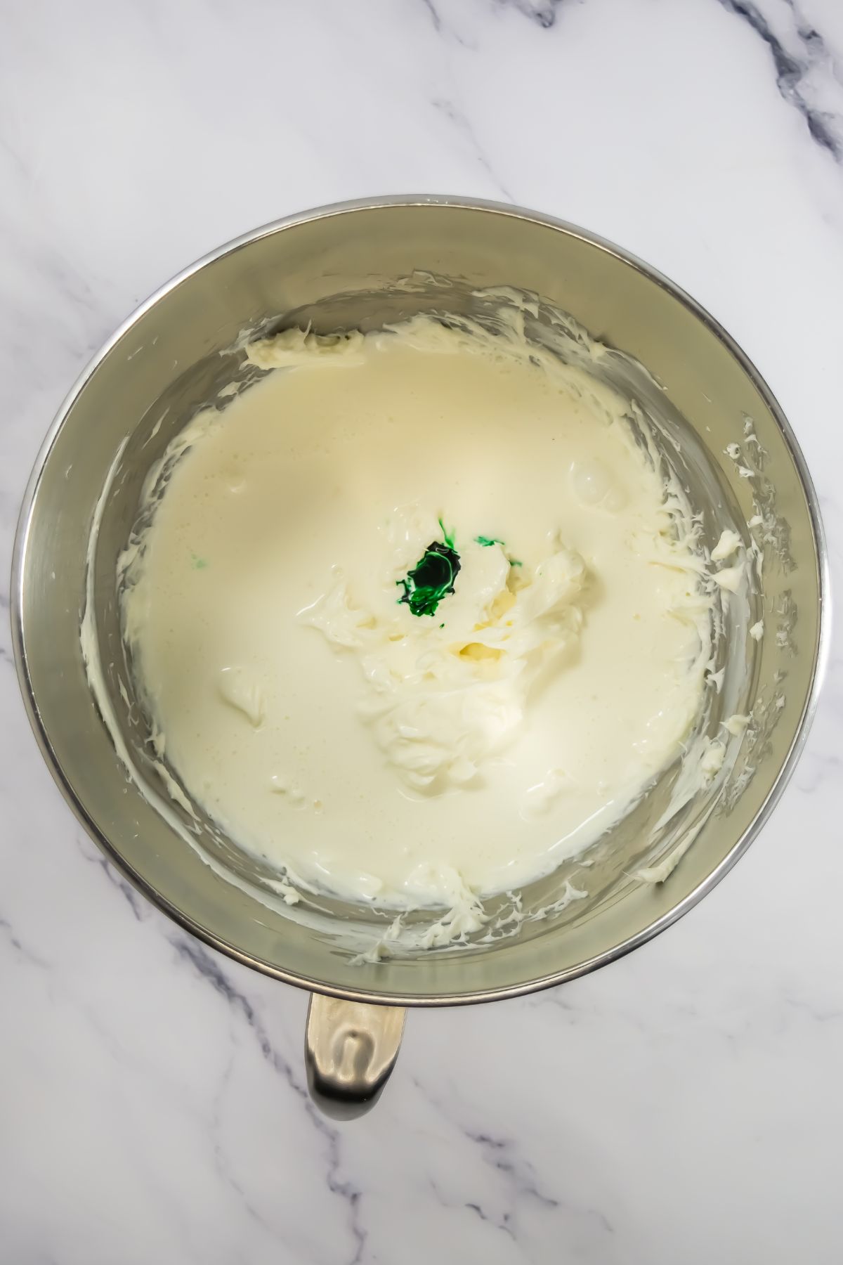 Cheesecake mixture in a bowl.