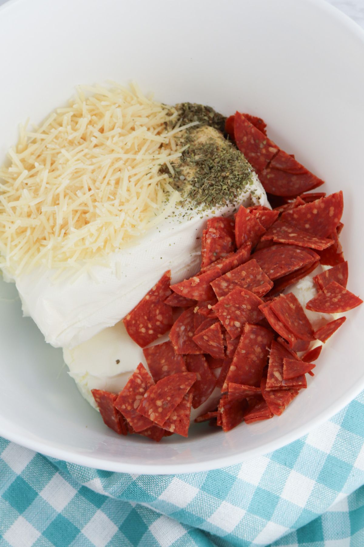 Cheeseball ingredients in a bowl.