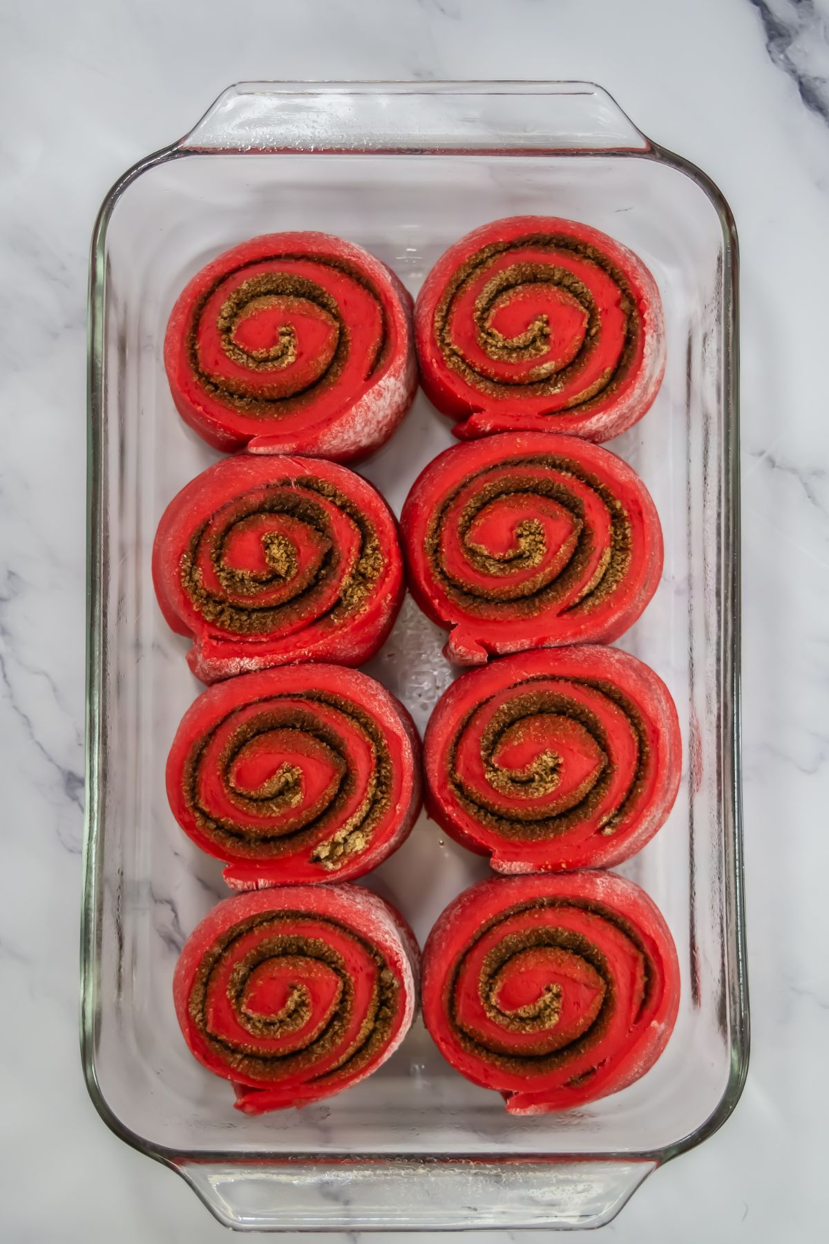 Cinnamon rolls in a baking dish.