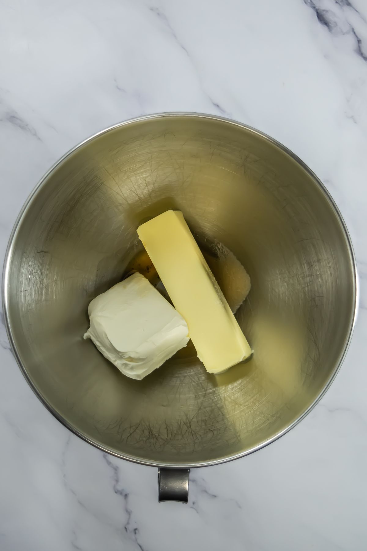 Butter and cream cheese in a bowl.