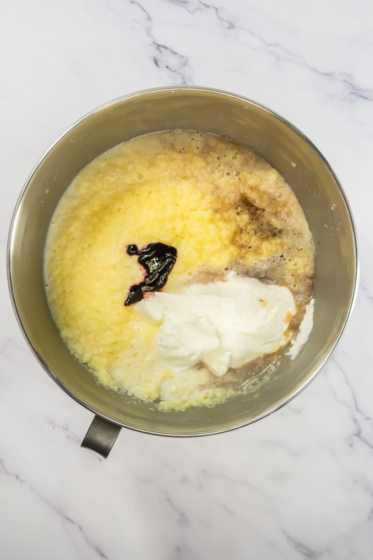 Butter and wet ingredients in a bowl.