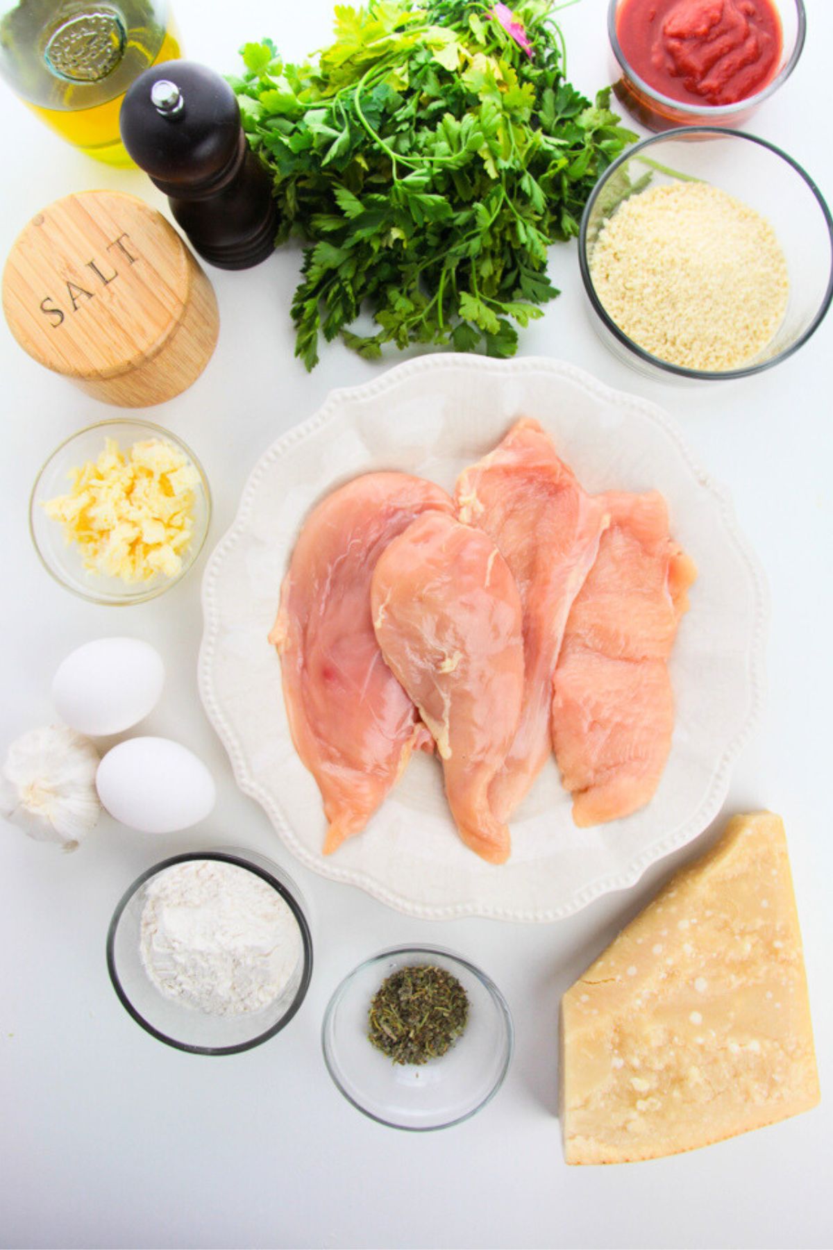 Air fryer chicken parmesan ingredients on a counter.