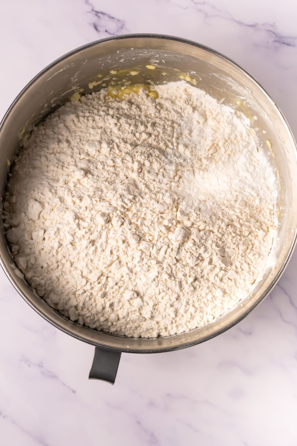 Flour in a mixing bowl.