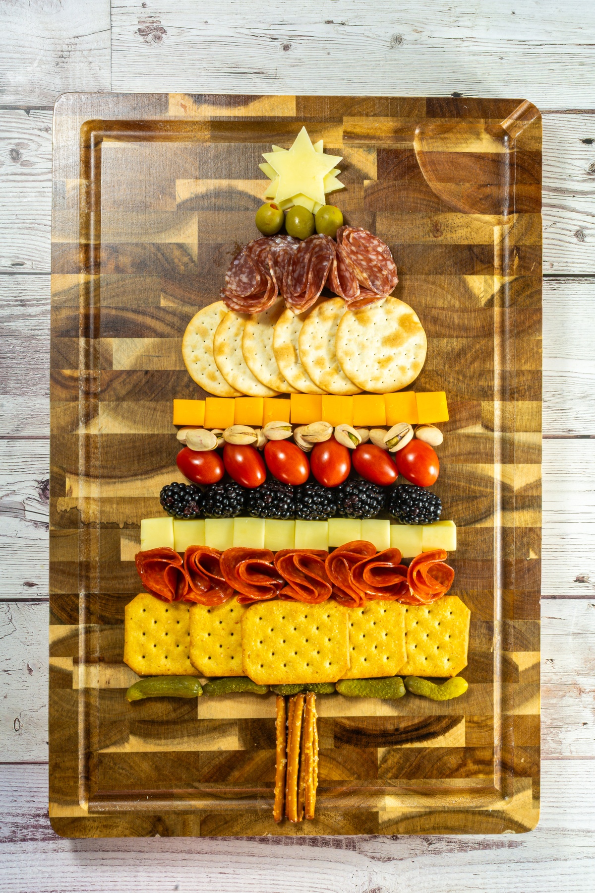 Charcuterie tray shaped like a christmas tree.