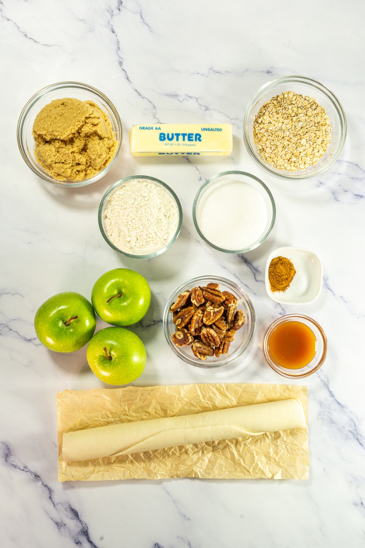 Mini dutch apple pie ingredients on a table.