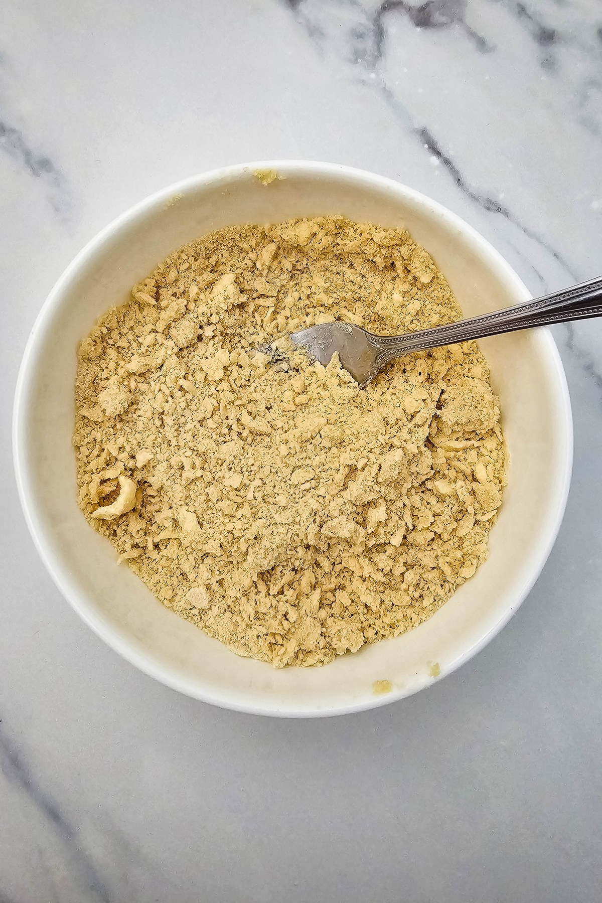 Crumble mixture in a bowl.