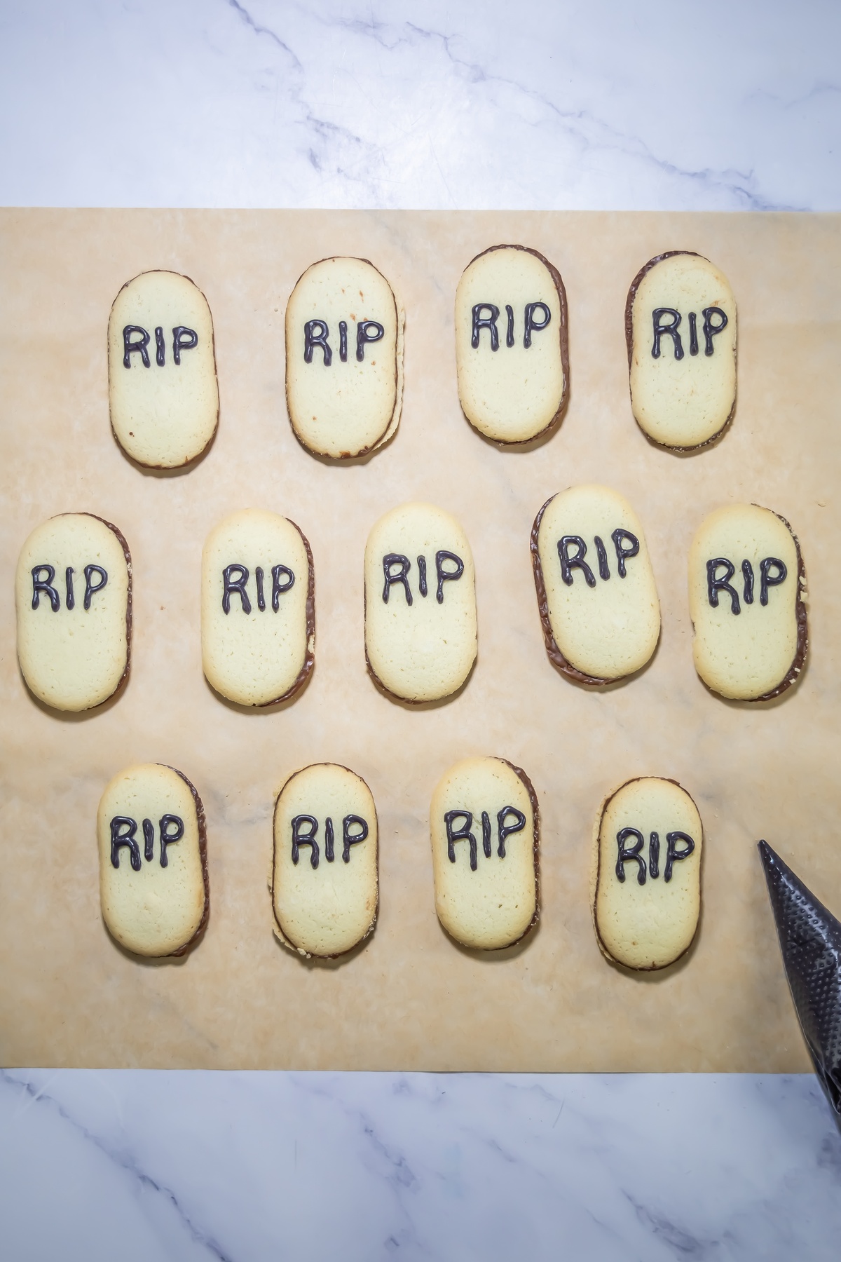 Milano cookies with RIP written on them.