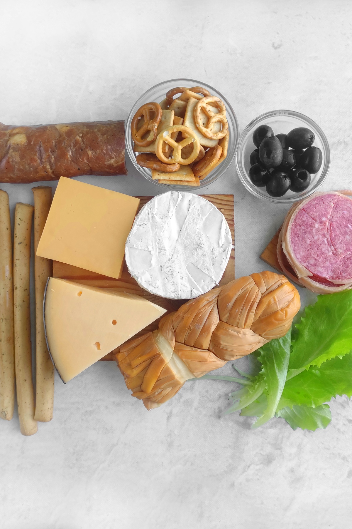Nutcracker charcuterie ingredients on a table.