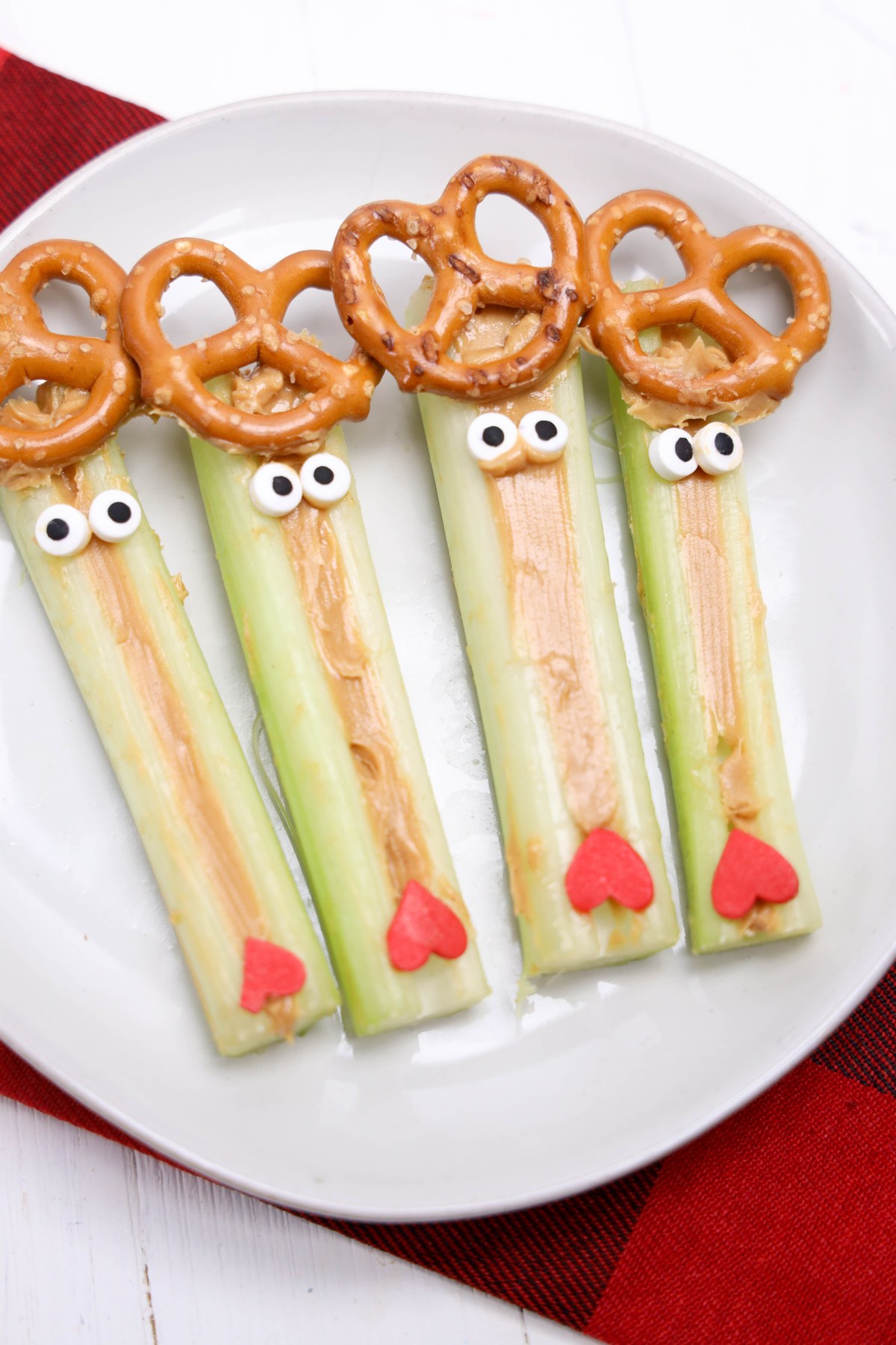 Rudolph decorated celery sticks on a plate.