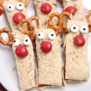 Rudolph decorated nutella sandwiches on a plate.