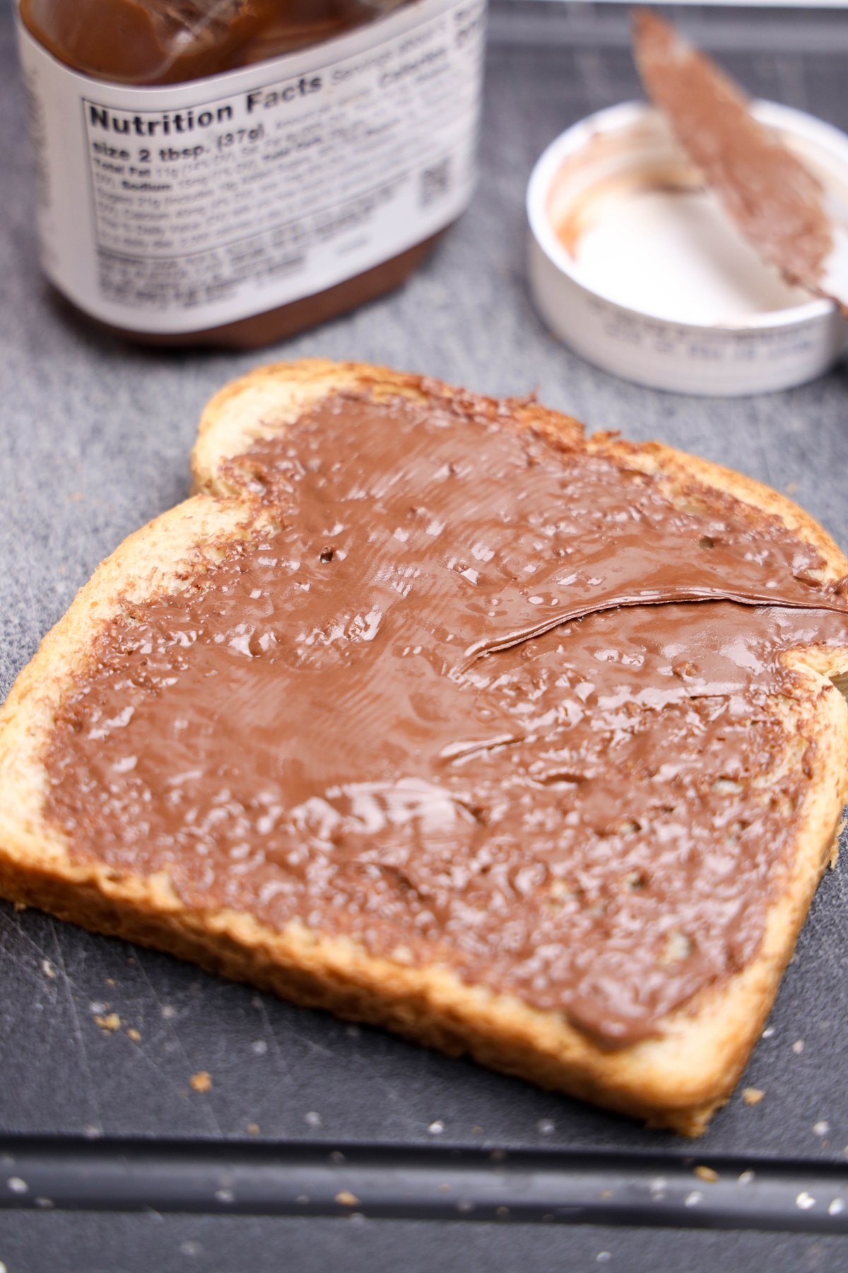 Bread with nutella spread on it.