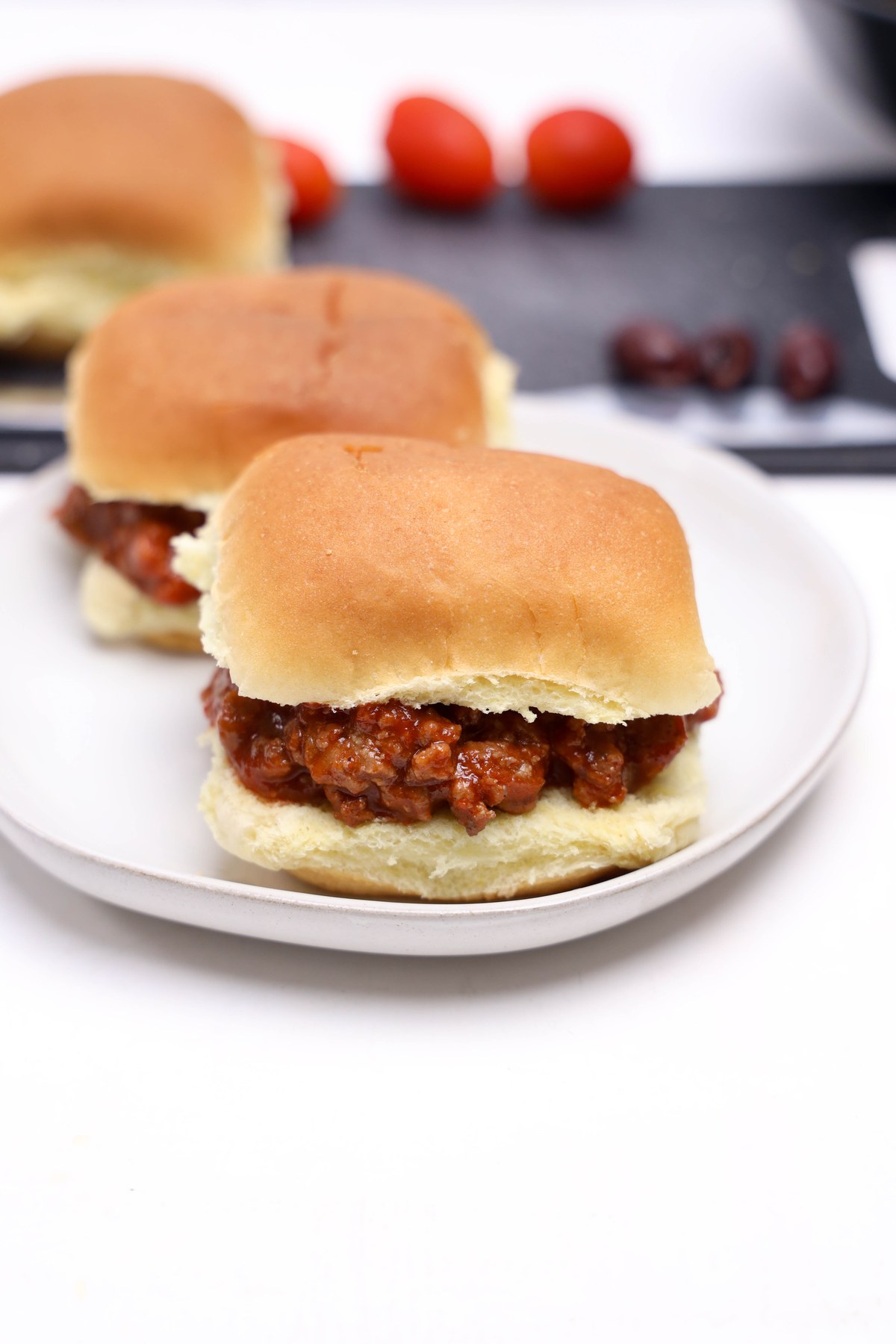 Slider buns with sloppy joe mixture added to them.