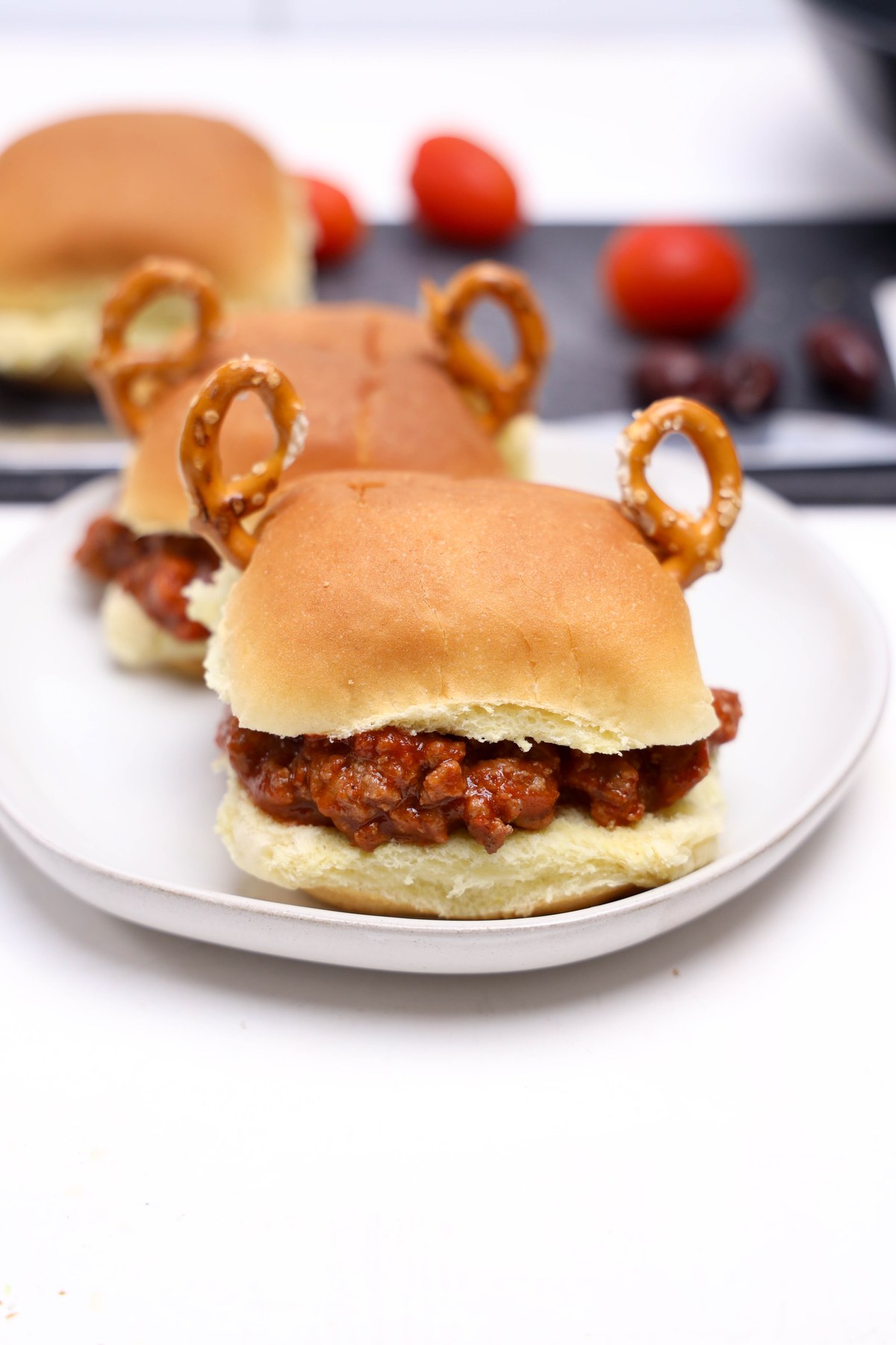 Pretzels added to tops of slider buns.