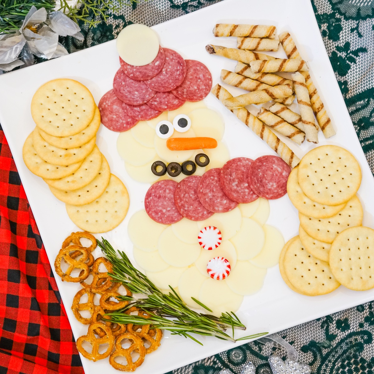 Snowman-shaped charcuterie board.