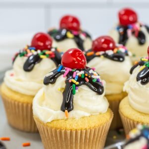Sundae cupcakes on a plate.