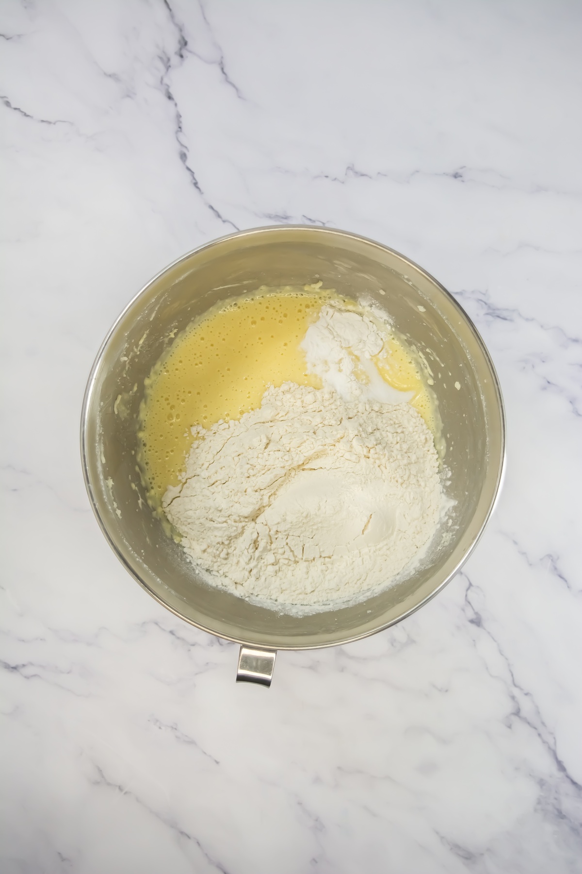 Flour added to cupcake batter.