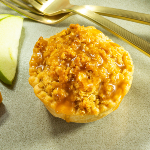 Mini dutch apple pie on a plate.