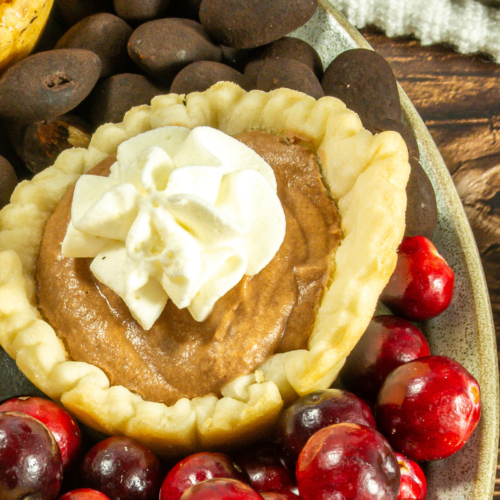 Mini pumpkin pie on a plate.